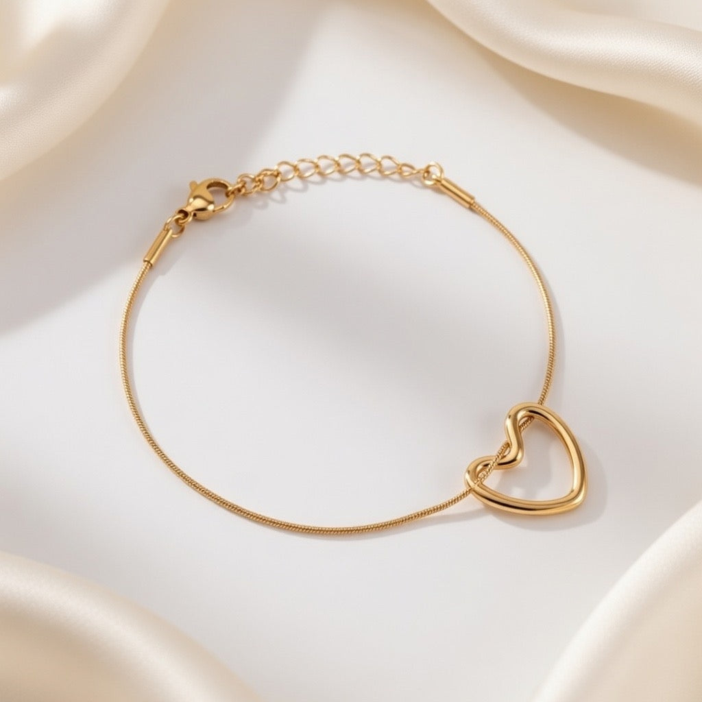 Golden Hollow Heart Bracelet – Delicate Interlocked Design