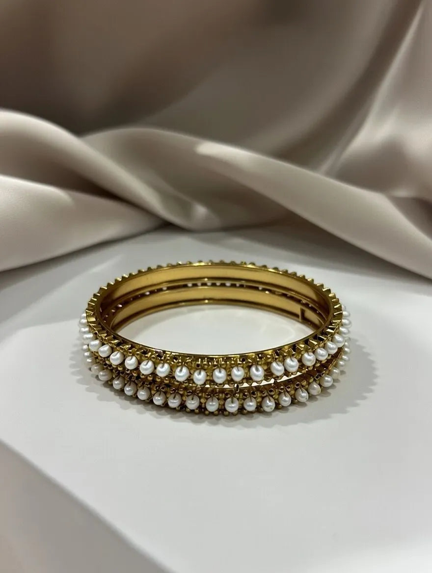 Pair of premium gold-plated bangles for women with white pearl detailing