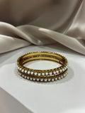 Pair of premium gold-plated bangles for women with white pearl detailing