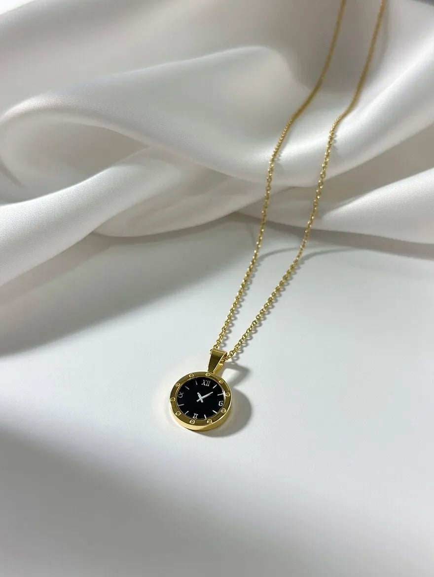 Aureva gold clock shape pendant for girls with black watch face design - Vintage necklace for women Pakistan