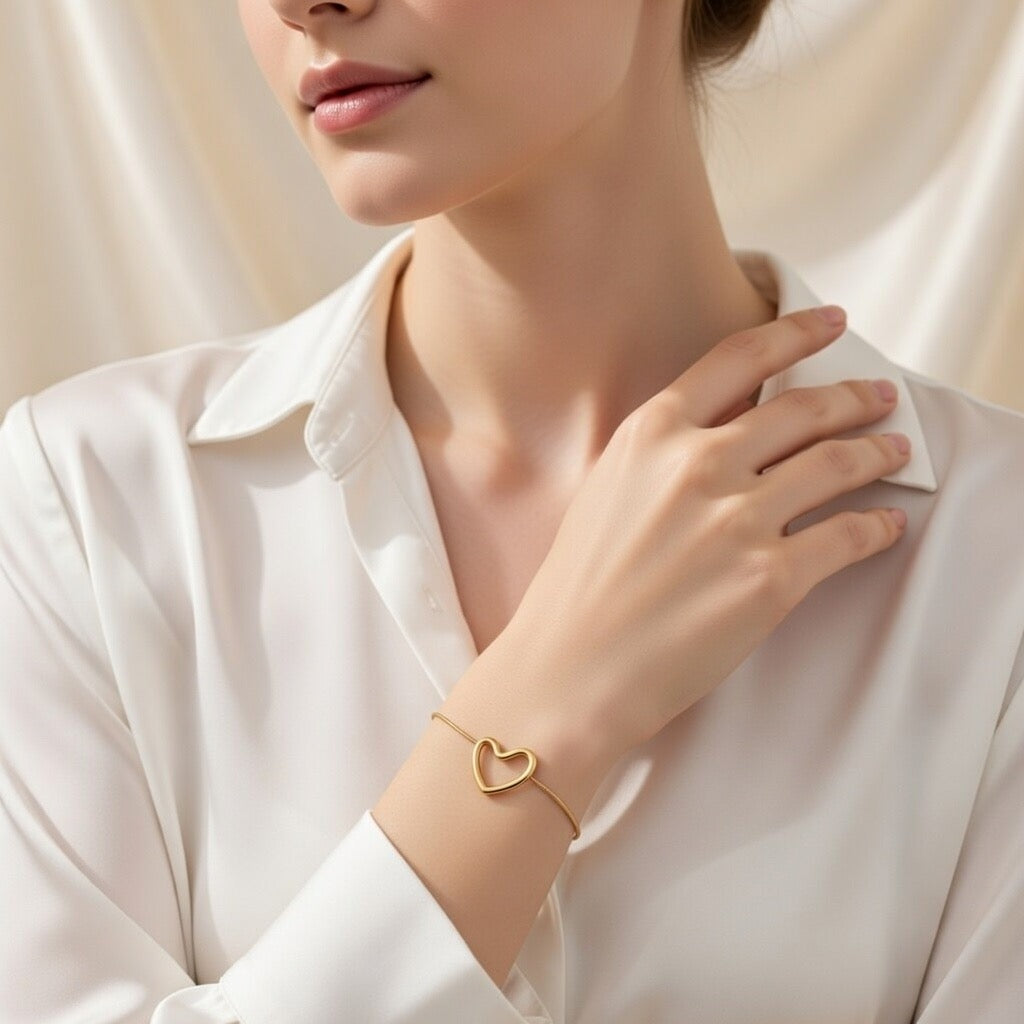 Golden Hollow Heart Bracelet – Delicate Interlocked Design