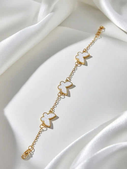 Aureva gold plated butterfly charm bracelet for women Pakistan - Elegant white and gold butterfly link bracelet for teenagers