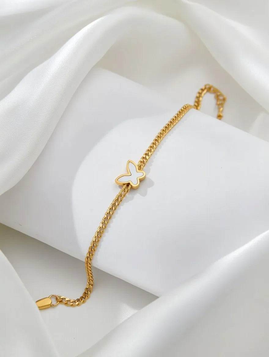 Gold beaded Butterflycharm bracelet for girls - Elegant tarnish-free artificial jewelry online shopping Lahore Karachi