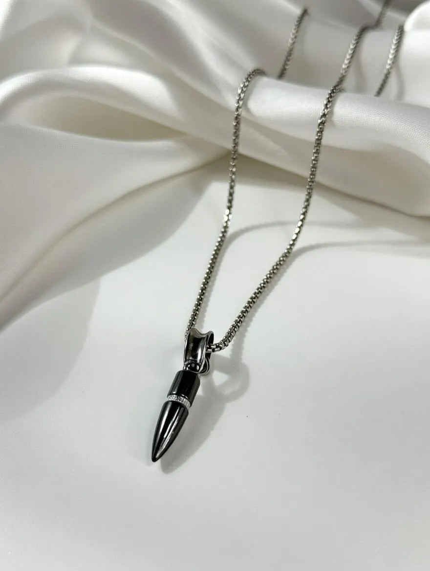 Men's black bullet-shaped pendant