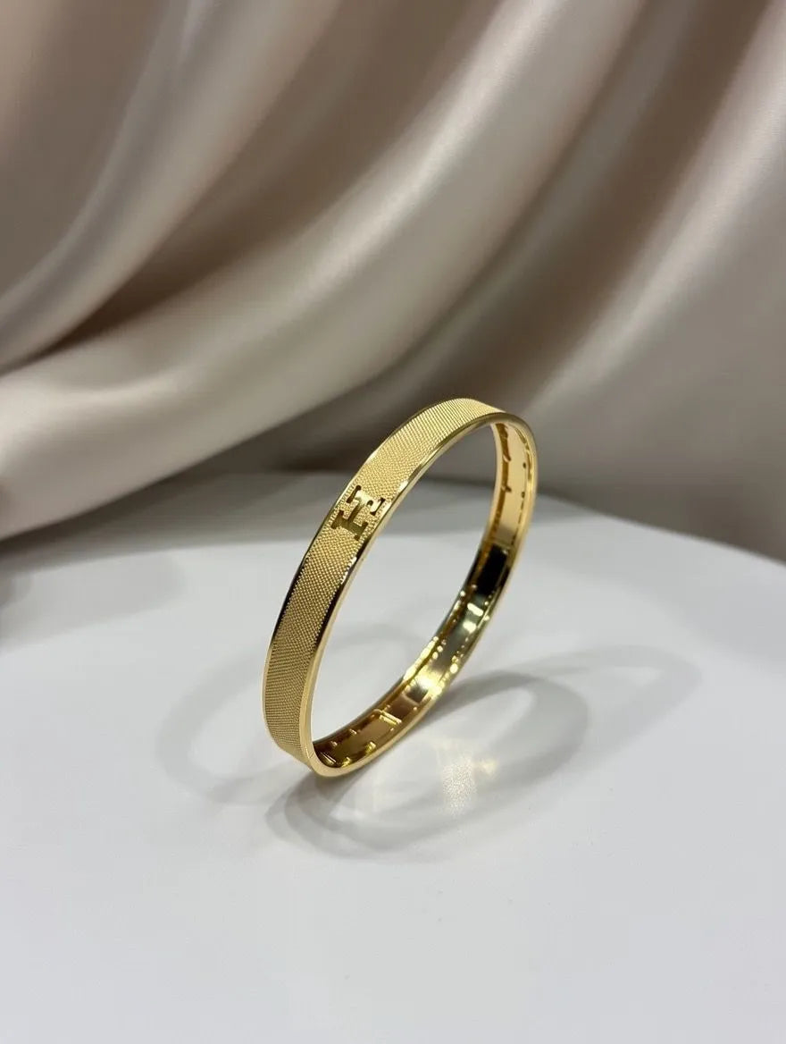 Luxury 18K gold plated textured bangle for girls with H motif design - Premium jewelry Pakistan