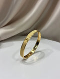 Luxury 18K gold plated textured bangle for girls with H motif design - Premium jewelry Pakistan