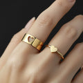 Two polished gold rings