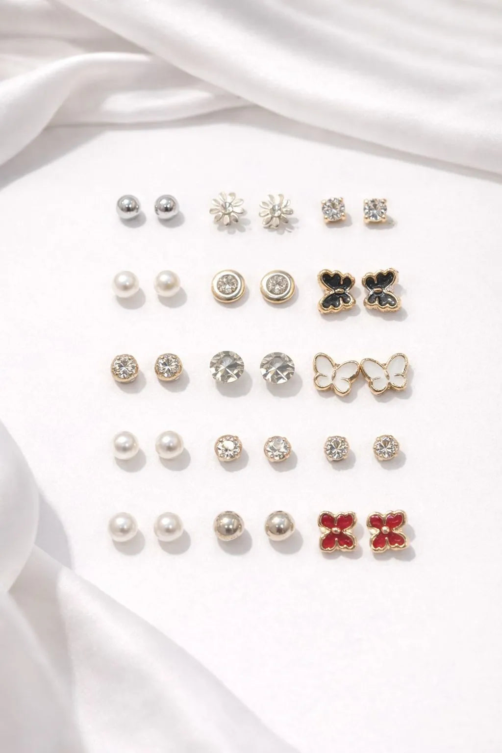 old-tone studs pearls and crystals earrings Pakistan